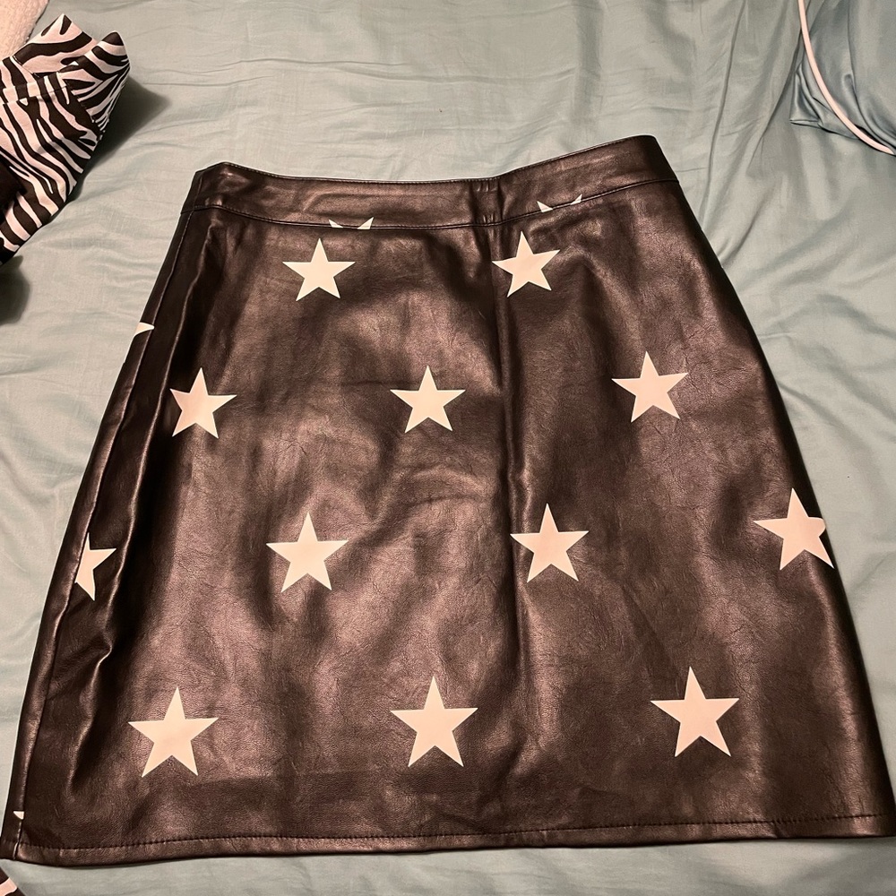Black pleather skirt with white stars